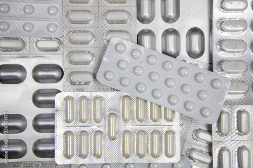 Different medicines: tablets, pills in blister pack, medications drugs, macro, selective focus