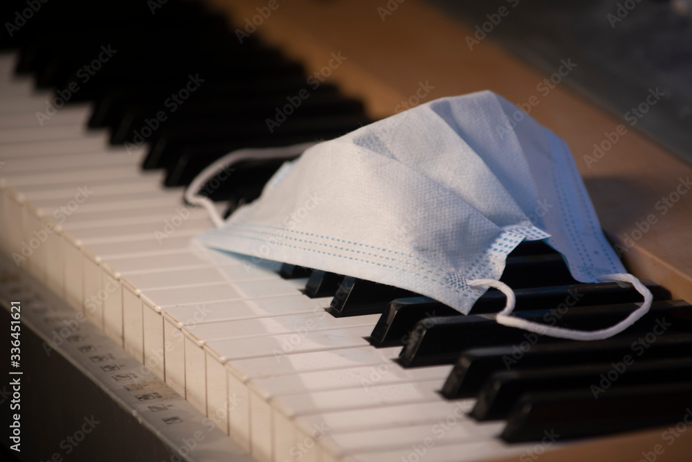 White safety breathing mask on piano top view. Medicine anti-virus mask  with filter Stock Photo | Adobe Stock
