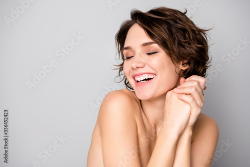 Portrait of cheerful lovely pretty girl enjoy her skin care palstic sugery aesthetic procedure make her body soft fresh isolated over gray color background