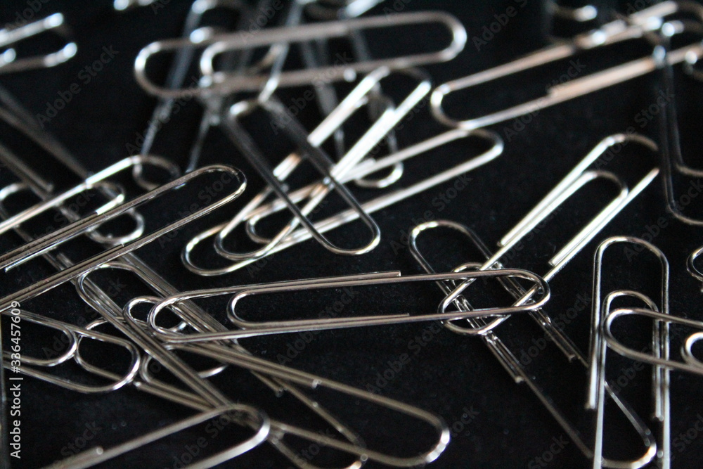 Fototapeta premium Steel paperclip wire clips stainless steel pressure forms