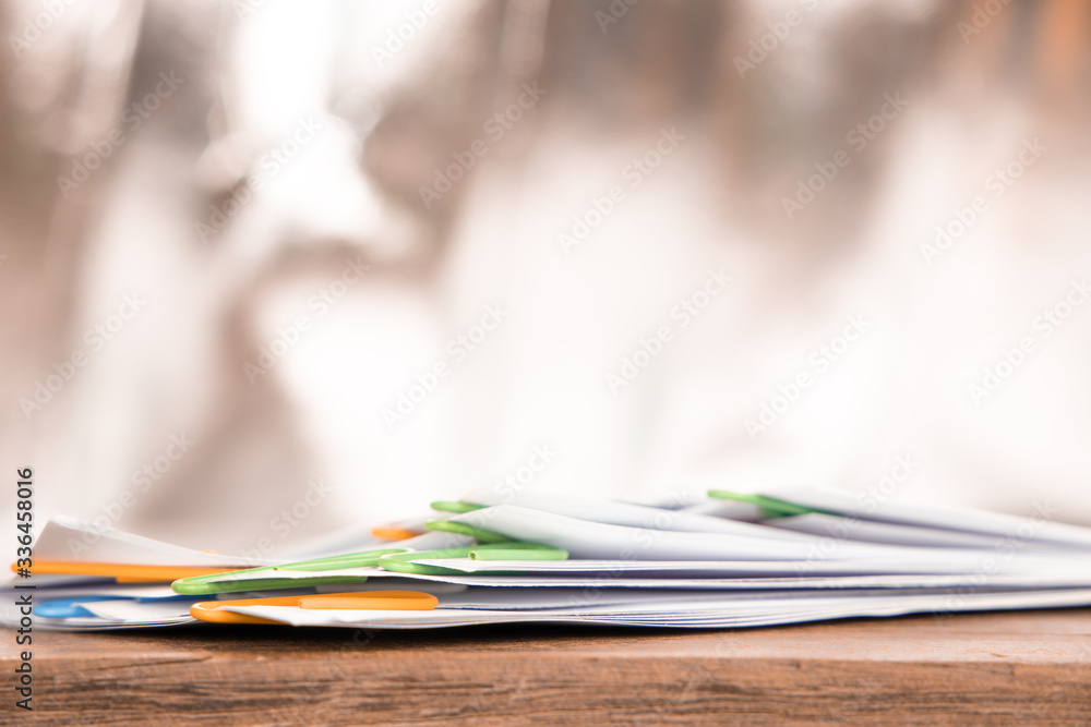 document paper on wood table. lot of papers. document paper on wood table. lot of papers.