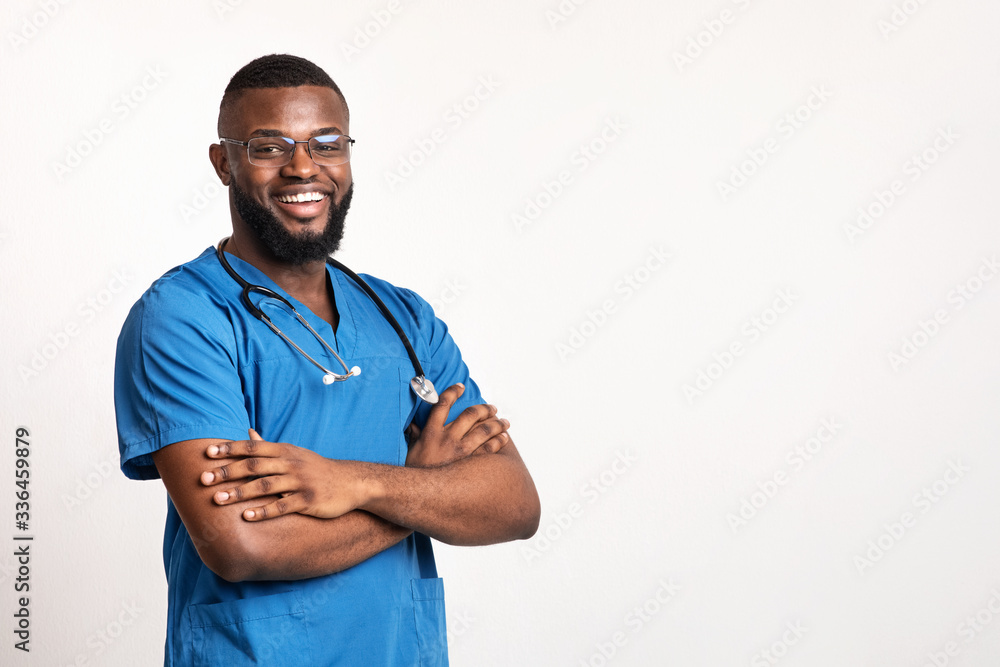 Successful black practitioner with glasses posing over white background Successful black practitioner with glasses posing over white background