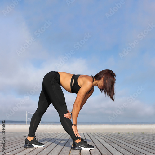 young athletic woman doing exercise
