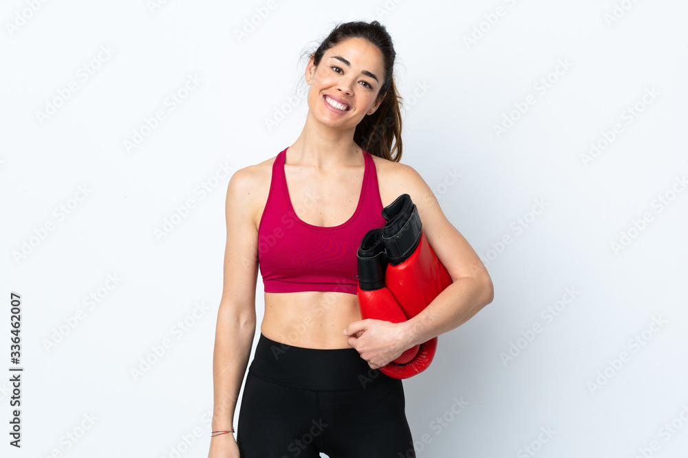 Sport woman over isolated white background with boxing gloves Sport woman over isolated white background with boxing gloves