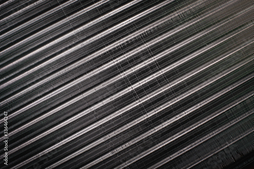 Closeup shot of car cooling radiator. High contrast vignette shot