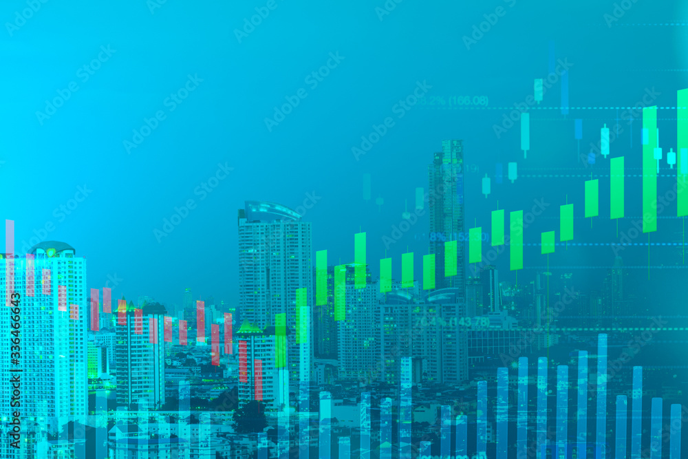 double exposure cityscape view and candlestick with fibonacci indicator graph on green background color concept, financial chart or business growth graph concept, copy space at left