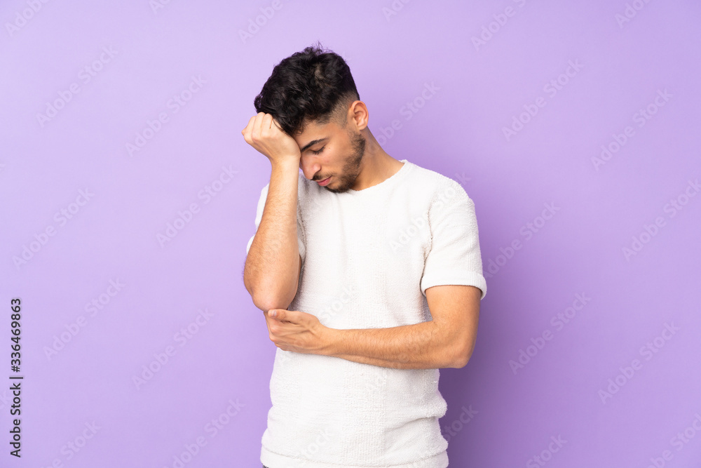 Arabian handsome man over isolated background with headache Arabian handsome man over isolated background with headache