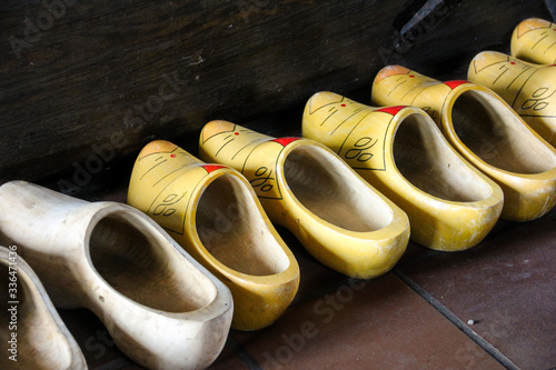 Patterned Dutch clogs lined up on the floor