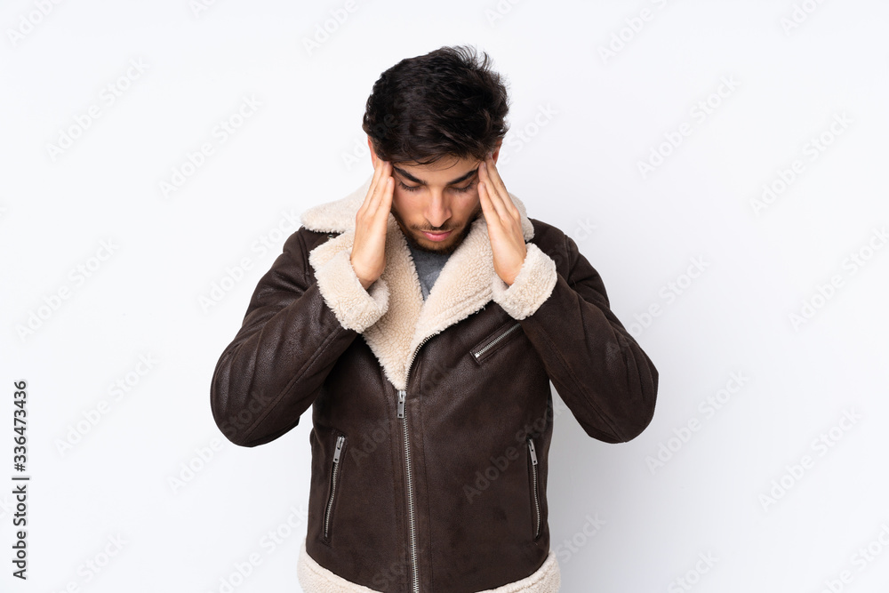 Arabian handsome man over isolated background with headache Arabian handsome man over isolated background with headache