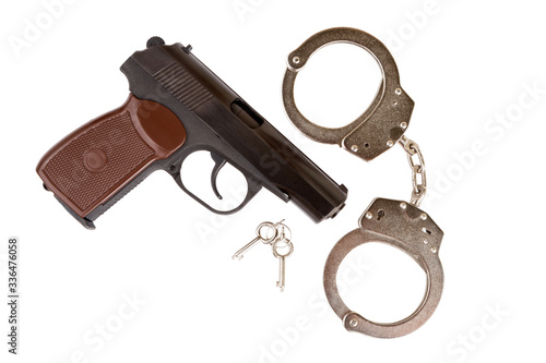 gun and handcuffs with keys