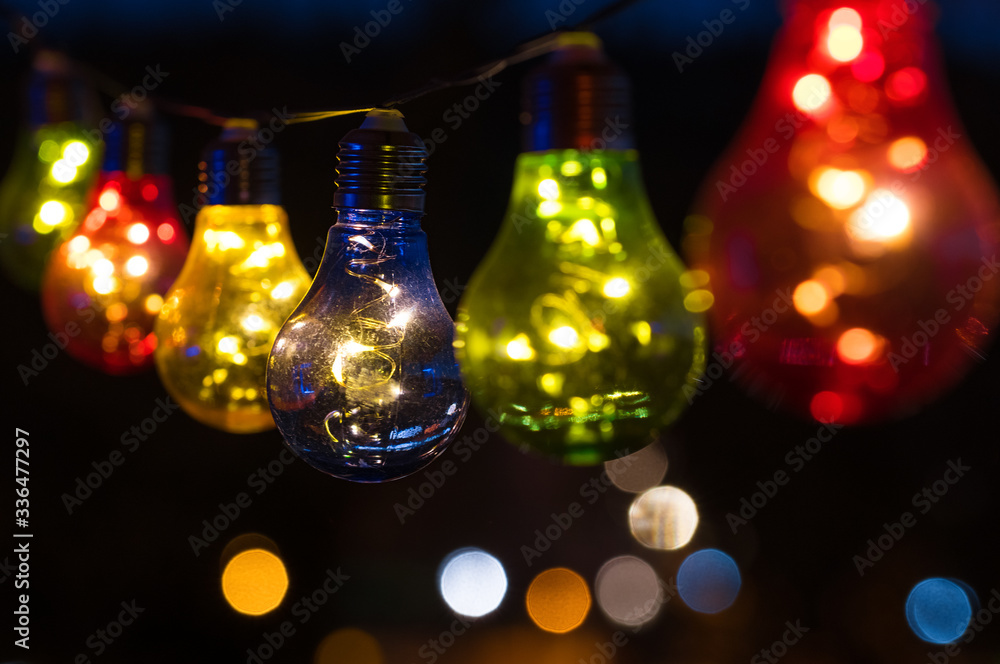 Chain of Colourful Light Bulbs by Night Chain of Colourful Light Bulbs by Night