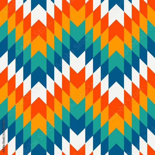 Ethnic style seamless pattern with chevron lines. Native americans ornamental background. Tribal motif. Colorful mosaic