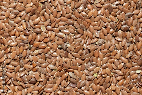 A solid background of peeled flaxseed