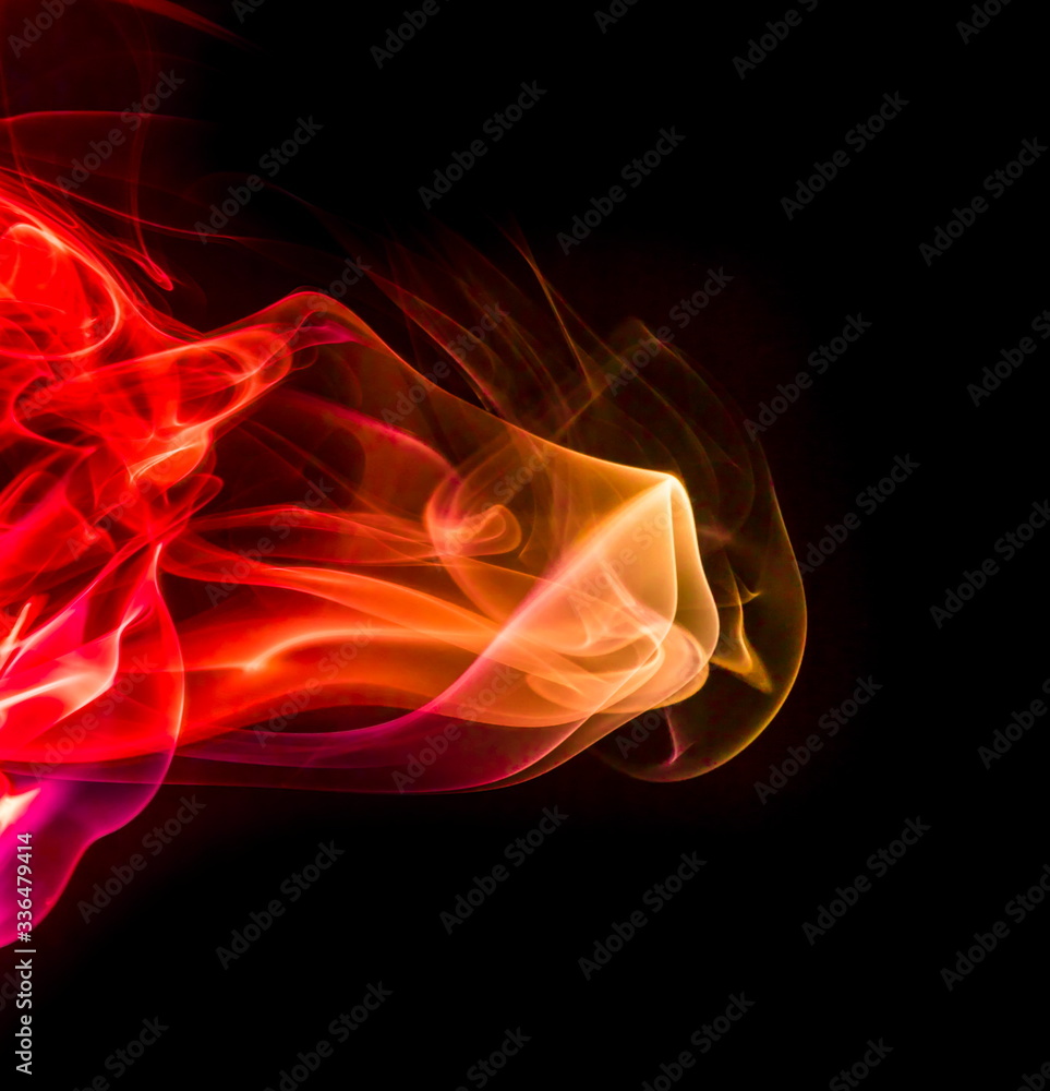Obraz premium Colored smoke on black background