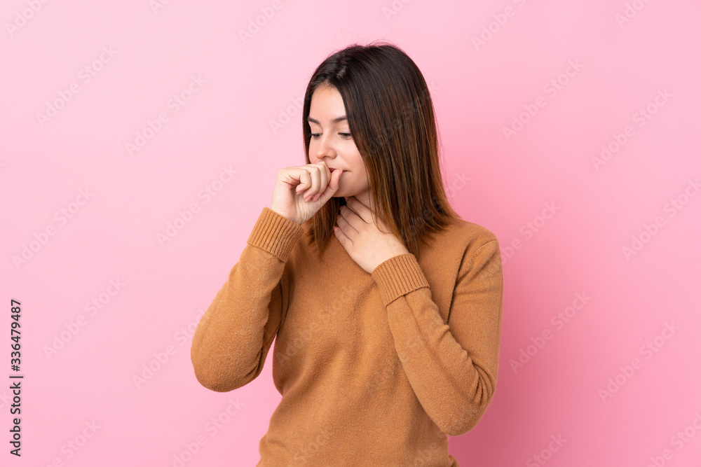 Young woman over isolated pink background is suffering with cough and feeling bad Young woman over isolated pink background is suffering with cough and feeling bad