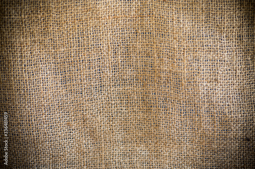 background of vintage retro rough jute burlap fabric, closeup