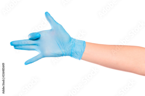 female hand in sterile gloves isolated on white background showing .hand gestures- Image © Fototocam