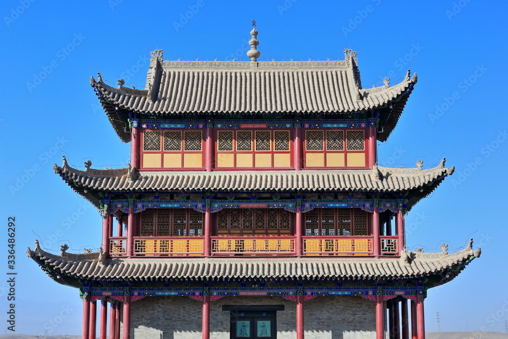 Upturned eaves-chiwen and chishou ornate-Xieshan roof-Gate of Sighs tower-Jiayuguan fortress-Gansu-China-0785 Upturned eaves-chiwen and chishou ornate-Xieshan roof-Gate of Sighs tower-Jiayuguan fortress-Gansu-China-0785