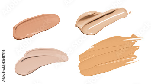 Makeup liquid foundation, beige concealer smears set. Light brown cosmetic make up base cream swatch smudge isolated on white background. BB CC cream texture photo