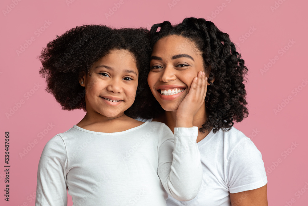Single Black Mom Posing To Camera With Her Cute Little Daughter Single Black Mom Posing To Camera With Her Cute Little Daughter