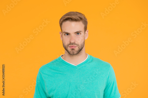 Beauty standards. Confident young man. Man with bristle on yellow background. Male beauty and fashion. Handsome man posing. Charismatic student. Handsome sexy man. Charisma concept © be free
