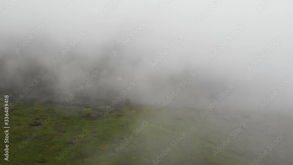 Aerial shot through the clouds. Flying through the clouds at Stara Planina national park, Serbia. Aerial shot through the clouds. Flying through the clouds at Stara Planina national park, Serbia.