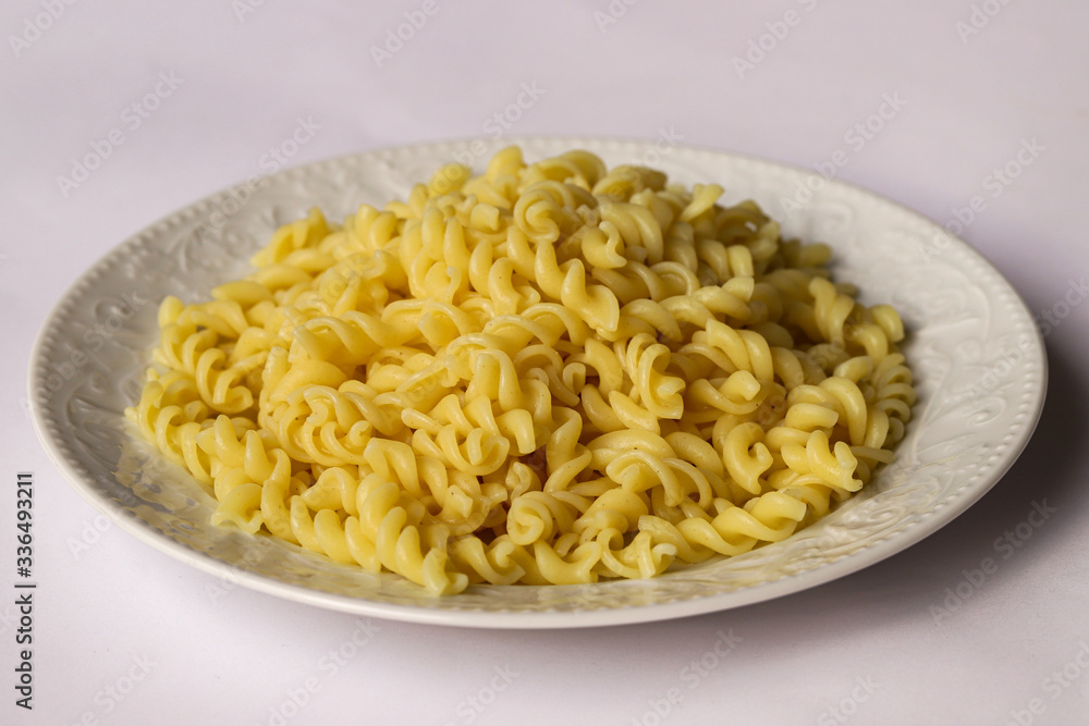 Turkish pasta in a white plate. Turkish pasta in a white plate.