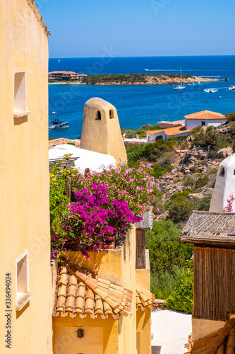 Porto Cervo, Sardinia, Italy - Picturesque view of luxury yacht port, marina and residences of Porto Cervo resort at the coast of Tyrrhenian Sea photo