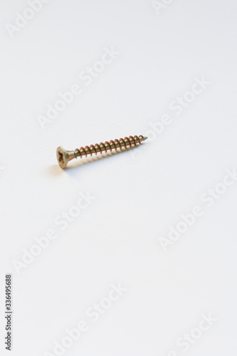 tapping screws made of steel, metal screw, iron screw, chrome screw, screws on a white background, wood screw