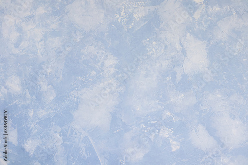 light blue textured background relief from putty