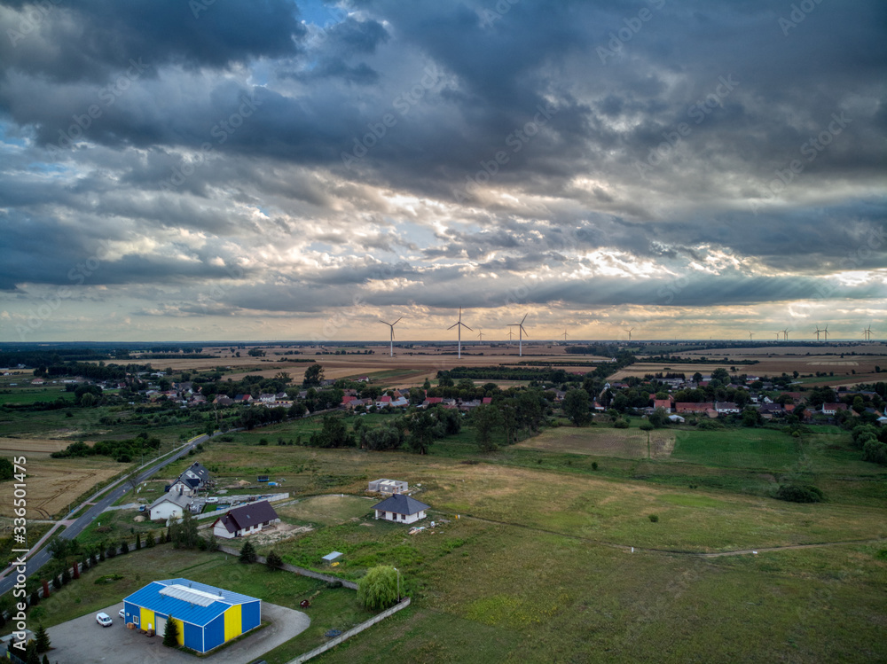 Field and Village in cloudy day from drone
