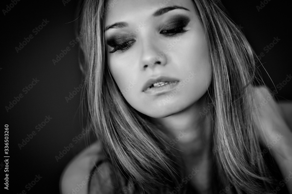 Fototapeta premium Beautiful woman black-white portrait. Beautiful face.