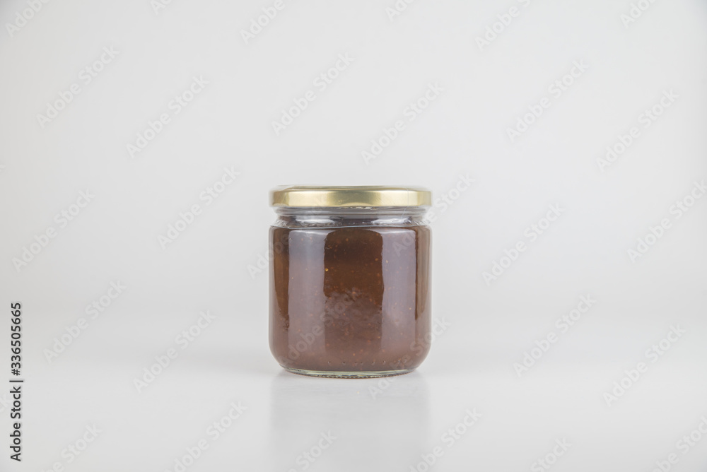 Canned tasty food - Jam jar on white colour background, close up studio object shot. Natural food and healty lyfestyle. Canned tasty food - Jam jar on white colour background, close up studio object shot. Natural food and healty lyfestyle.