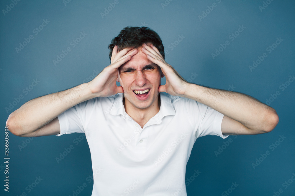 young goofy man with pimples pointing gesturing in studio, stupid bookwarm little crazy, lifestyle people concept young goofy man with pimples pointing gesturing in studio, stupid bookwarm little crazy, lifestyle people concept