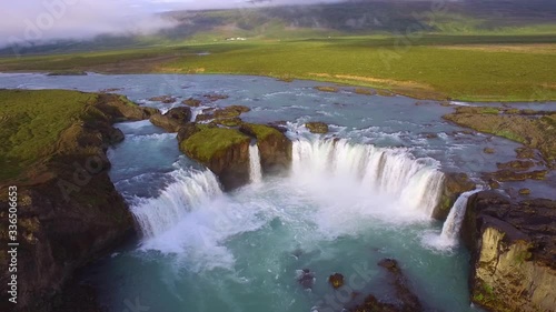 Aerial, drone shot, overlooking the Godafoss falls, and the Skjalfandafljot river, sunny, summer evening, in Bardardalur, Iceland photo