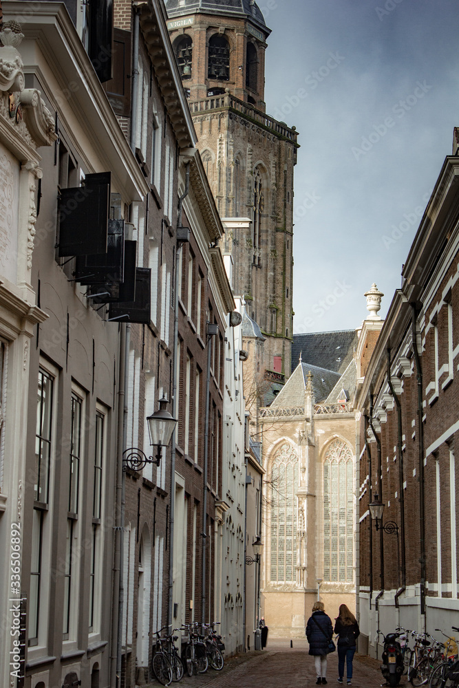 Fototapeta premium The Netherlands in winter with clear skies, buildings and streets