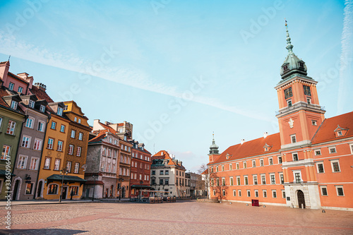 Royal Castle in Warsaw, Poland. Old colorful houses in the old town of Warsaw on a sunny.