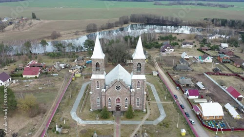 Drone shot on Catholic church of St. Iosif in Rubegevich, Belarus. Aerial view on catholic church architecture.
 photo