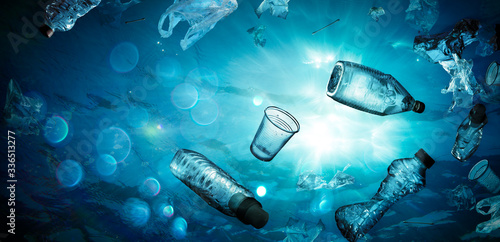 Plastic Pollution In Ocean - Underwater Shine With garbage Floating On Sea - Environmental Problem

