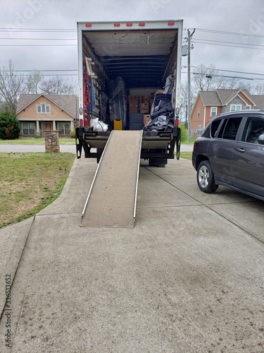 Moving Truck in Driveway.
