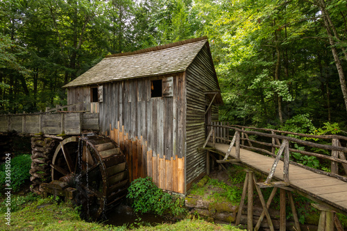 Water wheel and old mill in the woods.  Cades Cove, Smoky Mountains National Park, Tennessee
