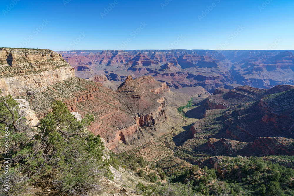 hiking the rim trail at the south rim of grand canyon in arizona, usa