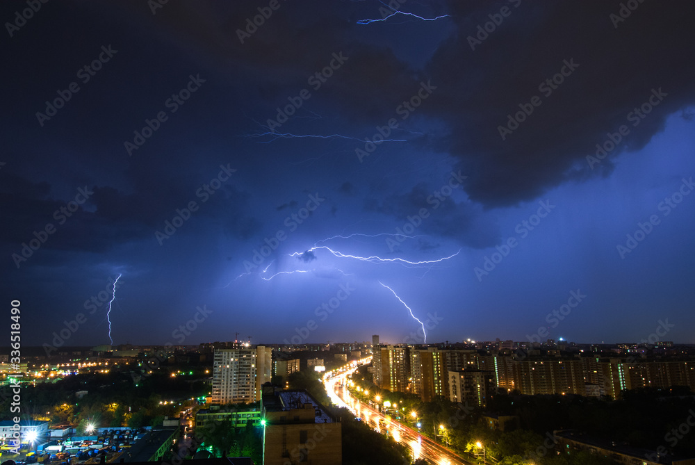 Summer thunderstorm with multiple lightnings over Moscow