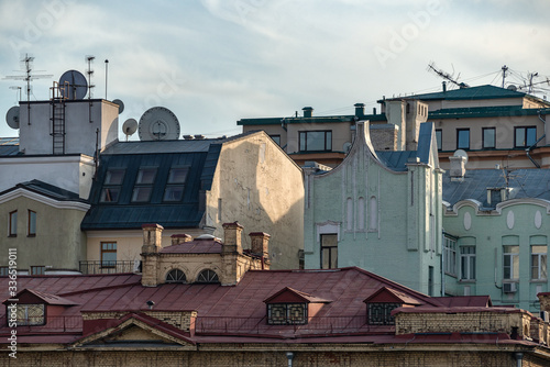 Roofs of old houses with TV antennas in the center of Moscow