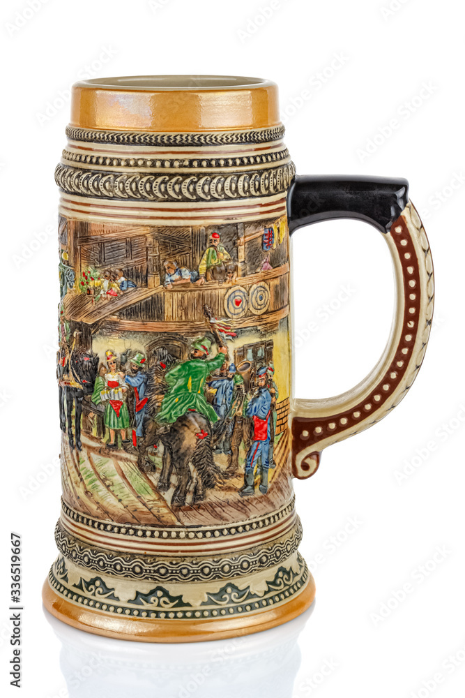 Big classical ceramic german beer mug isolated on white background Big classical ceramic german beer mug isolated on white background