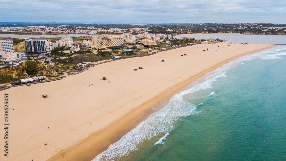 Aerial view of Rocha beach, Portimão city. Beautiful beach in Algarve, Portugal