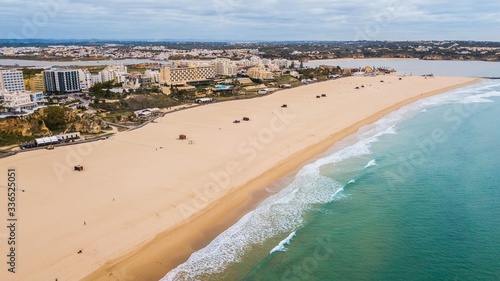 Aerial view of Rocha beach, Portimão city. Beautiful beach in Algarve, Portugal © Jair