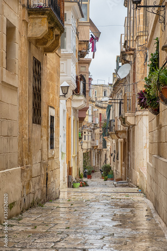Narrow ancient alley in Val...