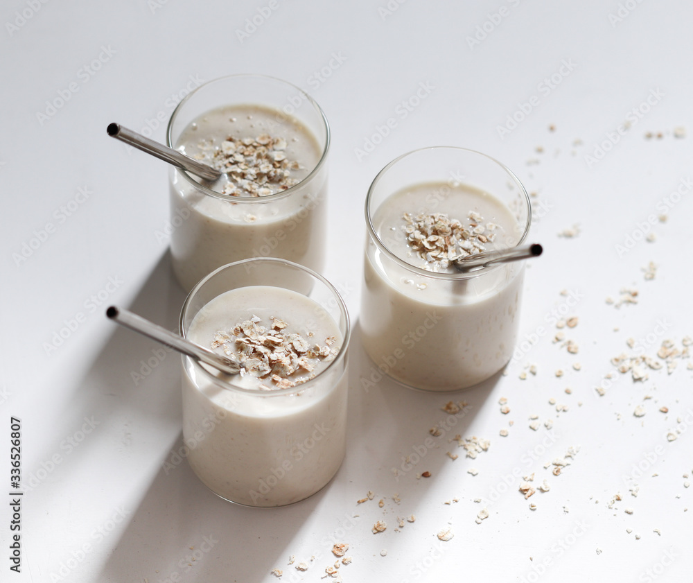 Smoothie with banana and oatmeal, natural energy cocktail Smoothie with banana and oatmeal, natural energy cocktail