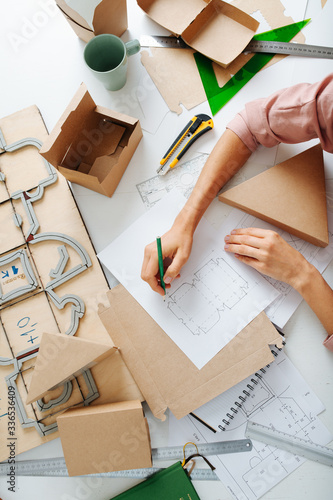 Top view of a box desiner at work